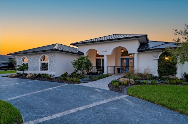 view of front of house with french doors