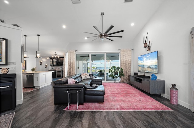 living room featuring ceiling fan and dark hardwood / wood-style floors