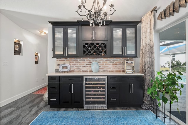 bar featuring lofted ceiling, decorative light fixtures, dark hardwood / wood-style flooring, tasteful backsplash, and wine cooler