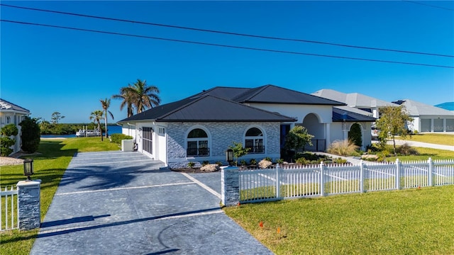 view of front of home with a front yard