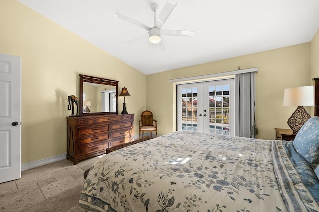 bedroom with lofted ceiling, stone tile floors, baseboards, access to outside, and french doors