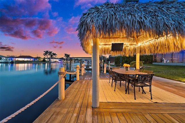 dock area featuring a gazebo and a water view