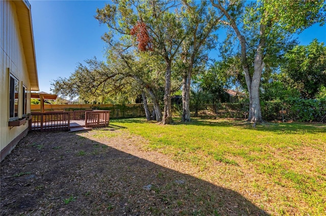 view of yard featuring a deck