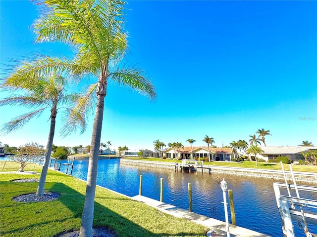 water view featuring a dock