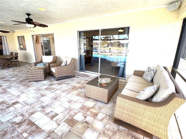 view of patio / terrace featuring ceiling fan and an outdoor hangout area