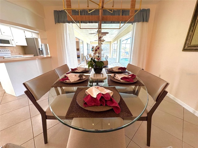 dining area featuring light tile patterned flooring