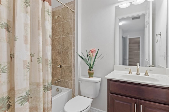 full bathroom featuring shower / bath combination with curtain, vanity, and toilet