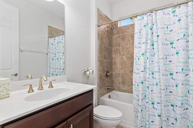 full bath featuring toilet, shower / bath combo, and vanity