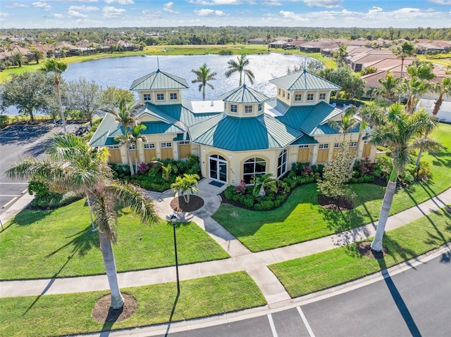 birds eye view of property featuring a water view