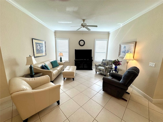 living room with ceiling fan, light tile patterned floors, a textured ceiling, and ornamental molding