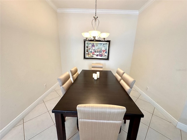 dining space with crown molding, light tile patterned floors, and a chandelier