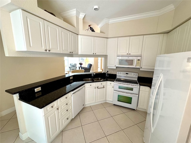 kitchen with ornamental molding, white appliances, sink, light tile patterned floors, and white cabinetry