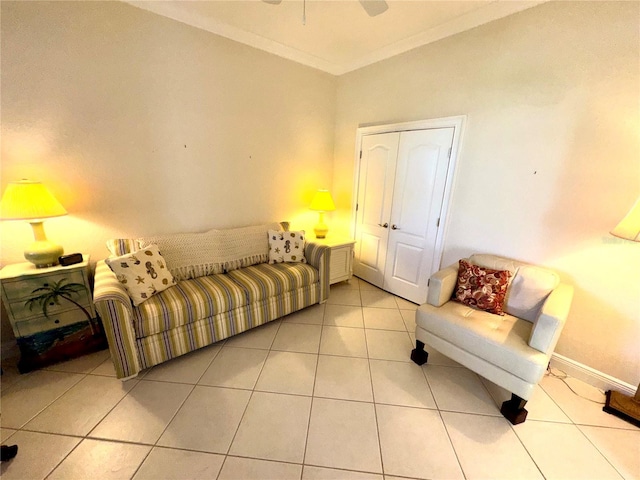 living room featuring crown molding and light tile patterned flooring