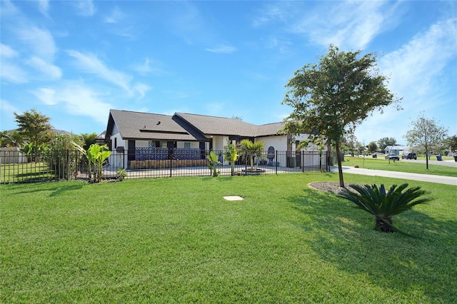 view of front facade featuring a garage and a front lawn