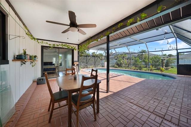 view of swimming pool with ceiling fan