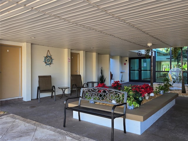 21260 Brinson Ave Unit 307, Port Charlotte, FL 33952 - view of patio / terrace featuring french doors