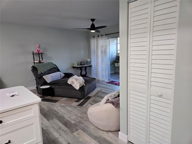 21260 Brinson Ave Unit 307, Port Charlotte, FL 33952 - living area with wood finished floors and a ceiling fan