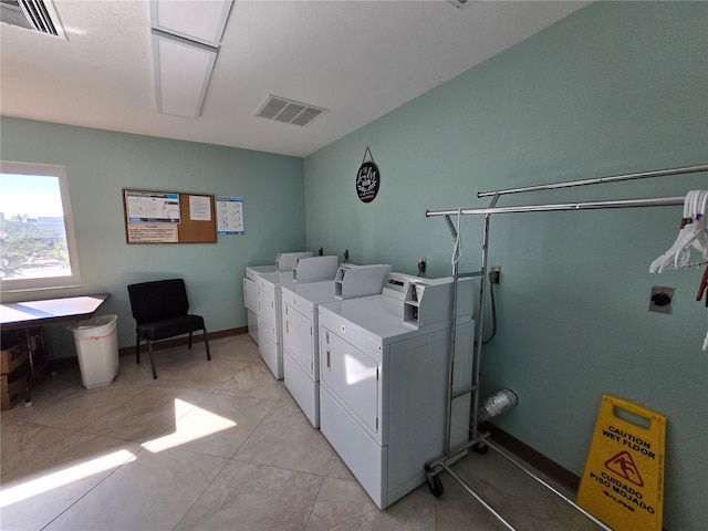 21260 Brinson Ave Unit 307, Port Charlotte, FL 33952 - community laundry room with washer and clothes dryer
