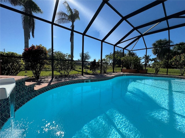 view of pool with a lanai