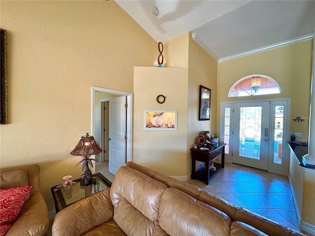 tiled living room with high vaulted ceiling and ornamental molding