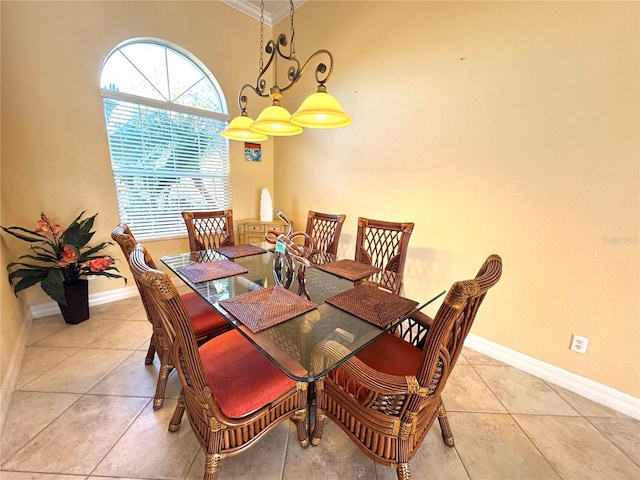 tiled dining room with ornamental molding