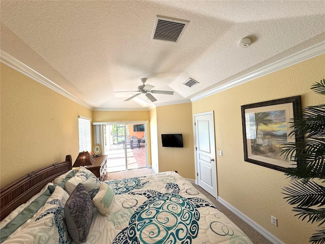 bedroom featuring ceiling fan, carpet, a textured ceiling, and ornamental molding