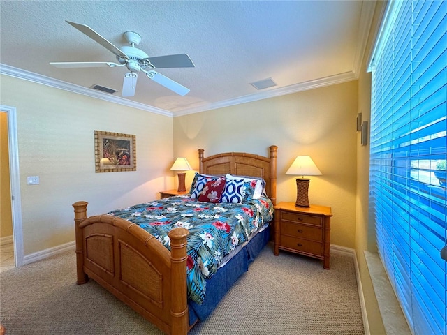 carpeted bedroom with multiple windows, ceiling fan, and crown molding