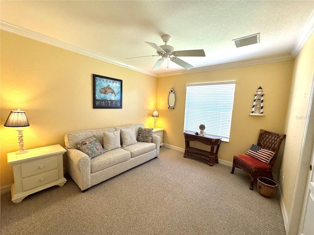 carpeted living room featuring a textured ceiling, ceiling fan, and ornamental molding