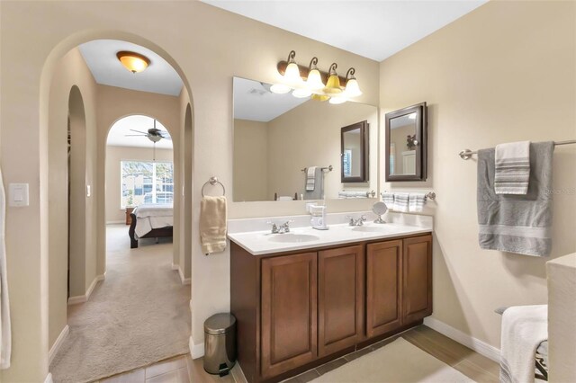 bathroom with vanity and ceiling fan