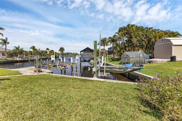 view of dock featuring a lawn and a water view