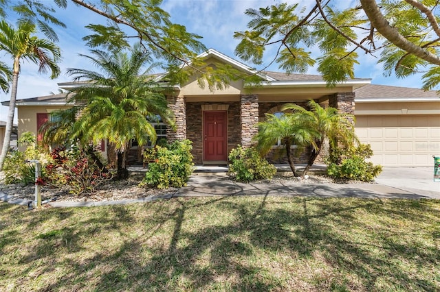 view of front of house featuring a garage and a front yard