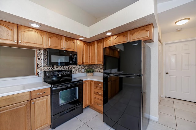 kitchen with black appliances, decorative backsplash, and light tile patterned flooring