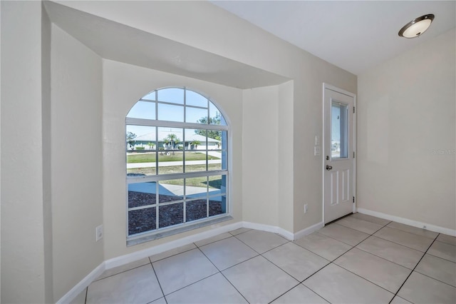 entrance foyer featuring light tile patterned floors