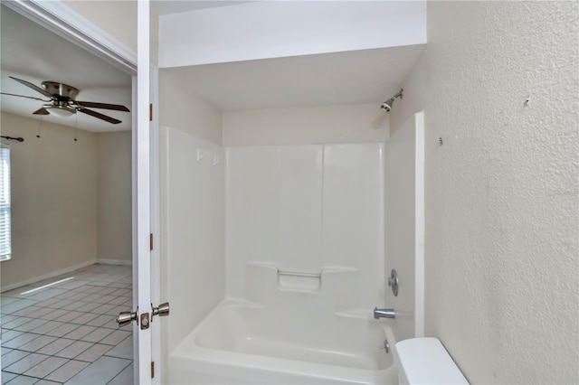 bathroom with tile patterned flooring, ceiling fan, and shower / bathing tub combination