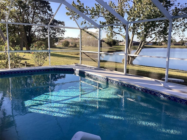 view of pool featuring a lanai and a water view