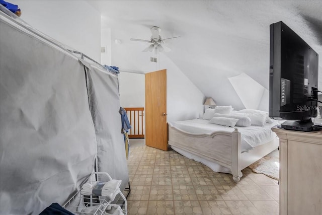 bedroom with ceiling fan and lofted ceiling