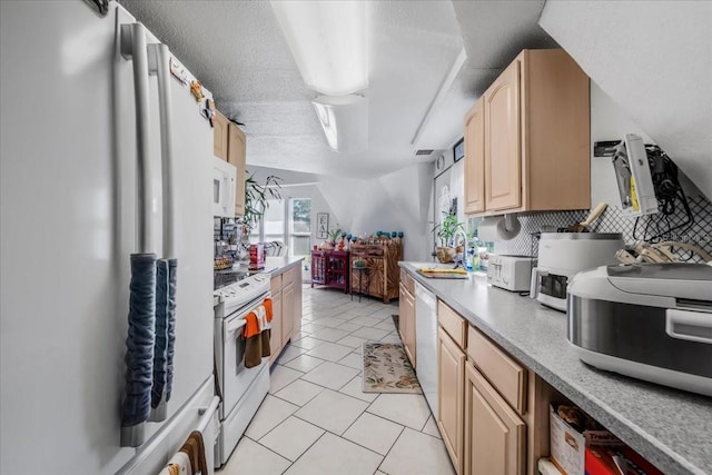 kitchen with backsplash, a textured ceiling, white appliances, light brown cabinetry, and light tile patterned floors