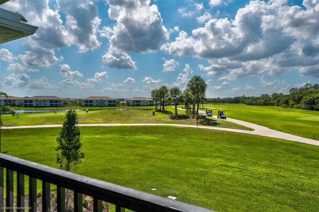 surrounding community featuring a lawn