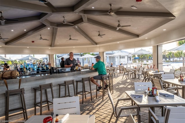 view of patio with a gazebo and an outdoor bar