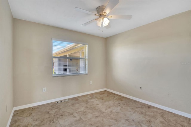 spare room featuring ceiling fan