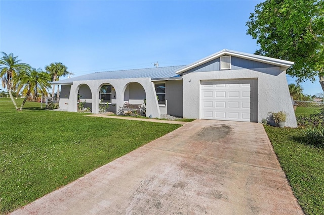 single story home with a front lawn and a garage