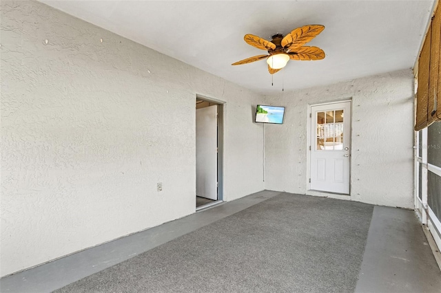 spare room with ceiling fan