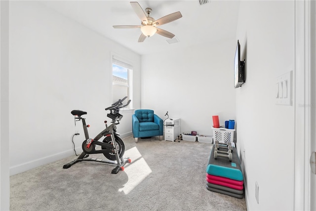 exercise room featuring carpet flooring and ceiling fan