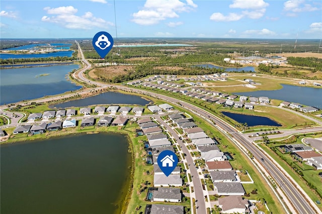 birds eye view of property featuring a water view