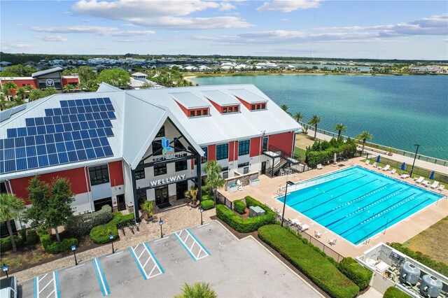 drone / aerial view with a water view