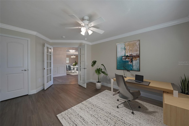 office space featuring french doors, ceiling fan with notable chandelier, dark hardwood / wood-style floors, and ornamental molding