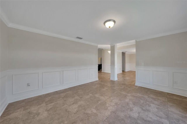 unfurnished room featuring crown molding