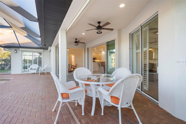 view of patio featuring ceiling fan