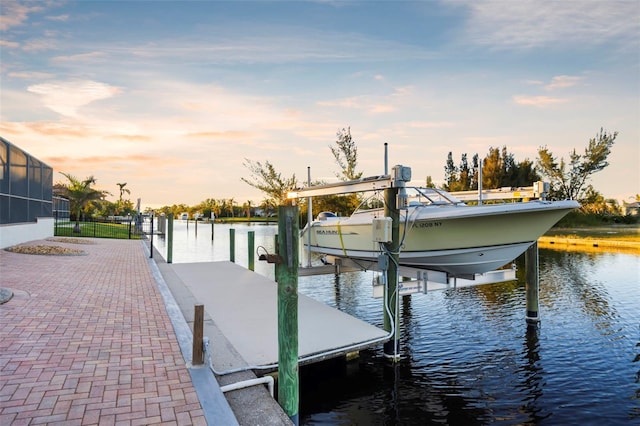 dock area with a water view