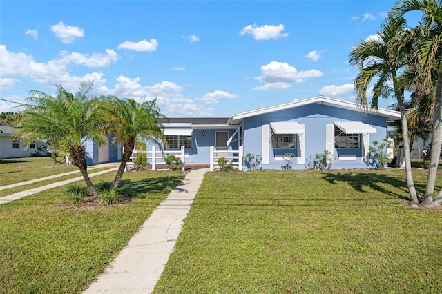 view of front of home with a front yard